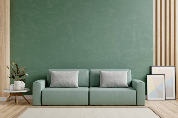 istock Mockup green wall with green sofa and decor in living room. 1483399357