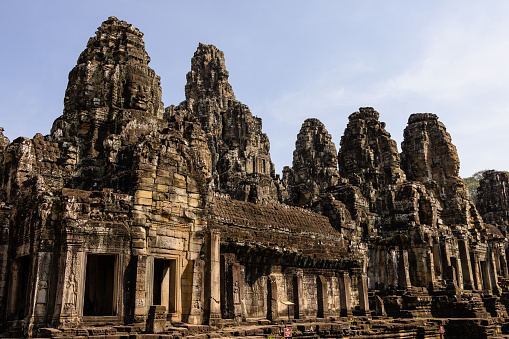 Bayon Temple is part of Angkor Thom which is in the Angkor Complex.  It is also known as the face temple with several towers featuring faces throughout the temple.