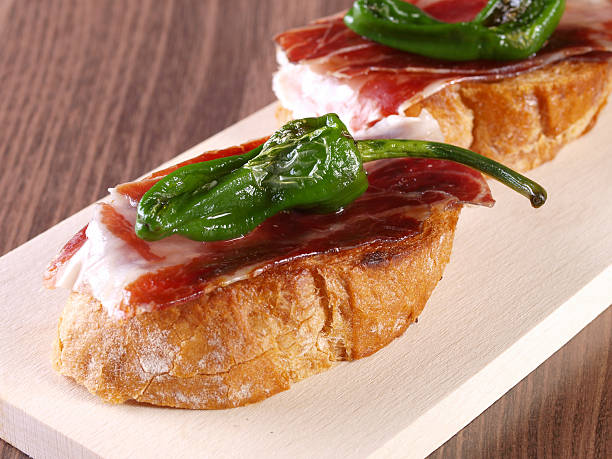 Cured Ham and Pepper “Montadito”. stock photo