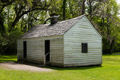 Charleston, South Carolina, USA - April 10, 2023: Slave Cabin at the historic Magnolia Plantation in Charleston, South Carolina.