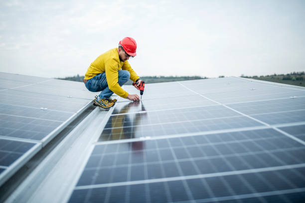 istock Solar panel technician repairing panels in power station. 1483412485
