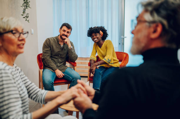 istock Multiracial people talking about their mental health on a group therapy session 1483412961