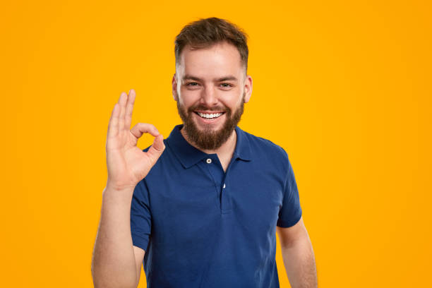 istock Cheerful man showing OK gesture 1483416899