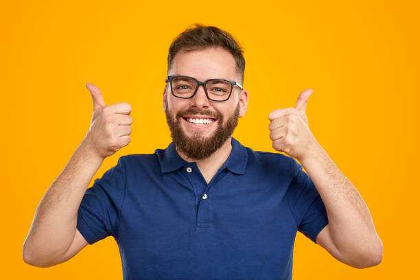 istock Happy man in glasses showing like gestures 1483416916