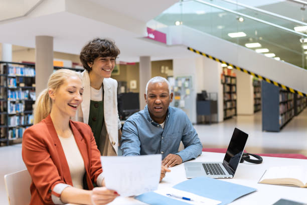istock Readers and students in the library 1483417107