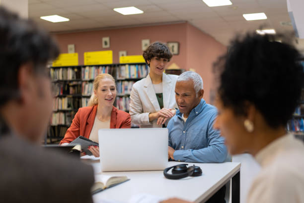 istock Readers and students in the library 1483417127