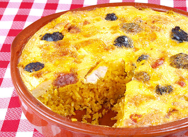 Close-up of golden pie stuffed with rice, cheese and meat stock photo