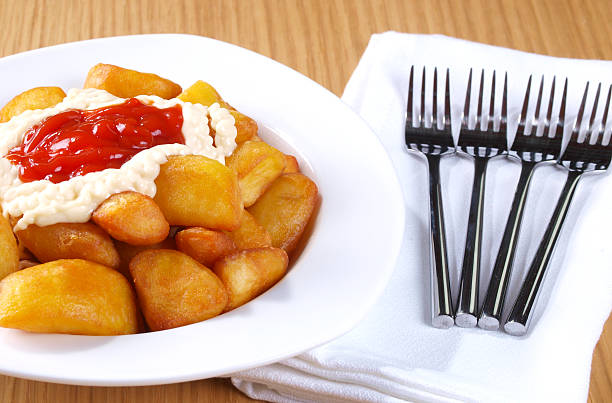 istock Patatas Bravas – Hot spicy fried potatoes 148342263