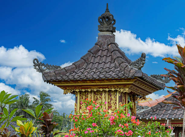 istock Balinese temple roof and blue sky 1483423071