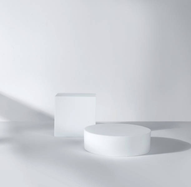 istock Empty round and square podium with window shadow for product presentation 1483425693