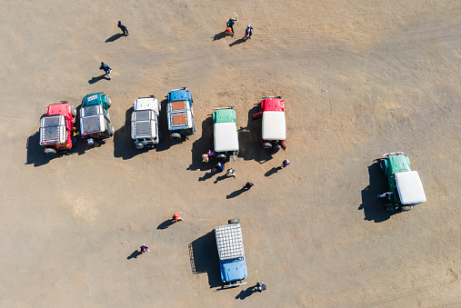 Aerial view of Jeeps vehicle that is used by tourists for activities in the Bromo Tengger Semeru National Park area. Mt. Bromo is a popular tourist destination in East Java, Indonesia.