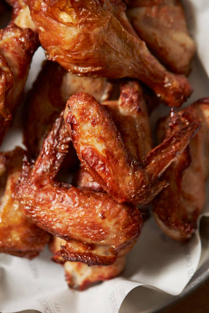 istock grilled chicken legs, grilled chicken wings 1483432543