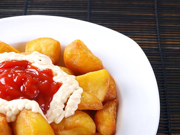 istock Patatas Bravas – Hot spicy fried potatoes 148344010