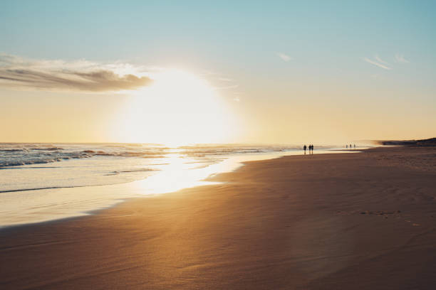istock Long exposure of bright orange sunset. 1483443862
