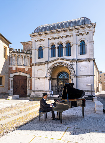 Padua, Italy, April 2023. the pianist who performs in the square in the city center