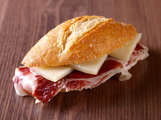 Cured ham and cheese sandwich. stock photo