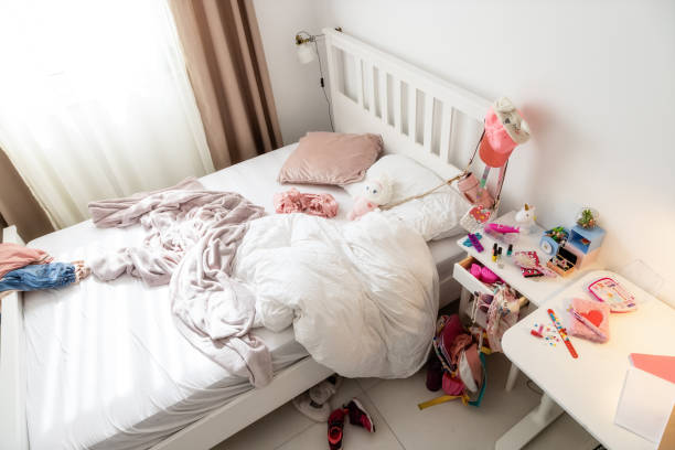 istock mess after playing in girl's room. spread bed 1483463257