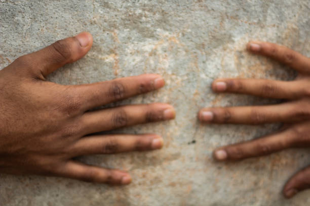 istock Ten fingers of both hands are placed on the ground 1483466050