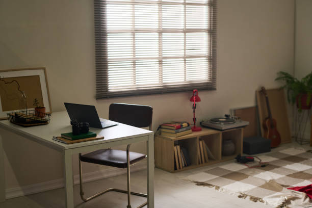 istock Workplace with laptop in teen room 1483466431