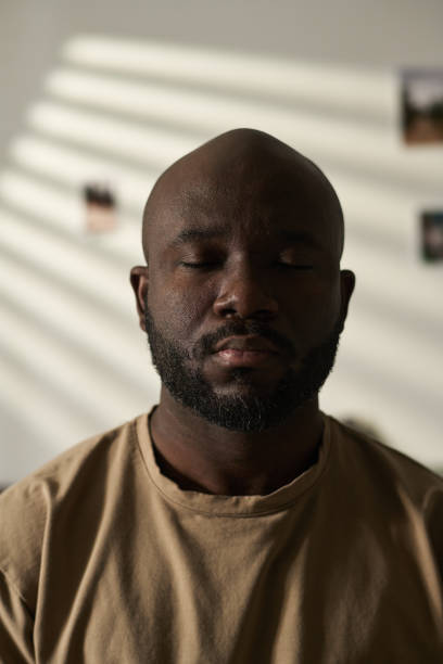 istock Man with closed eyes concentrating his attention 1483467399