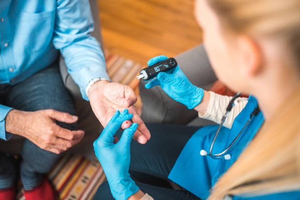 istock Blood Sugar Test On A Senior Caucasian Patient 1483467683
