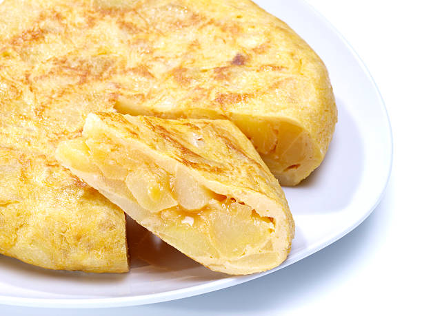 Tortilla espaͱola, an omelette made with eggs and potato stock photo