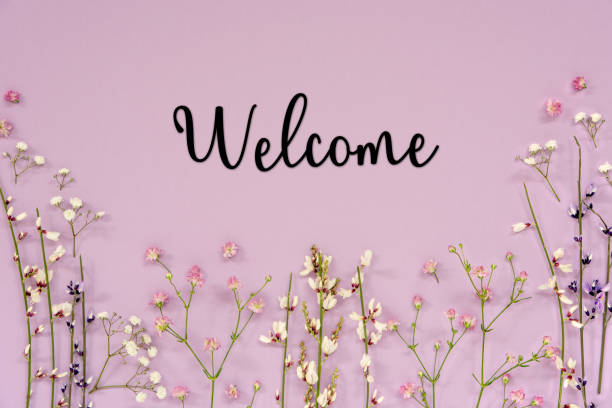 istock Purple Spring Flower Arrangement, English Text Welcome 1483468950