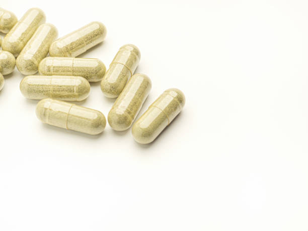 istock Flat lay of Andrographis paniculata capsules isolated on white background. 1483472697