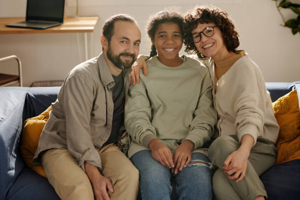 istock Happy family with adopted child 1483472802