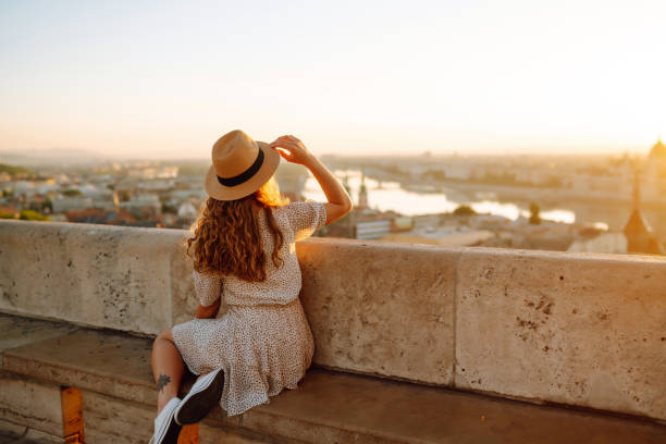 istock Smiling female tourist i 1483478671
