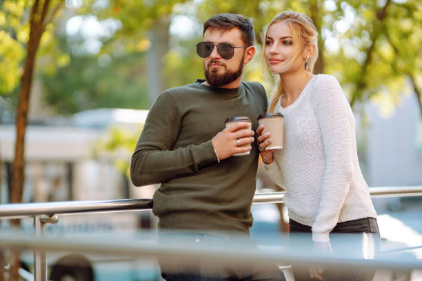 istock Happy young couple spending time together, drinking coffee 1483485244