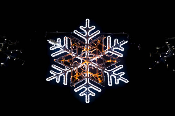 istock Snowflake light from a Christmas garland 1483490763