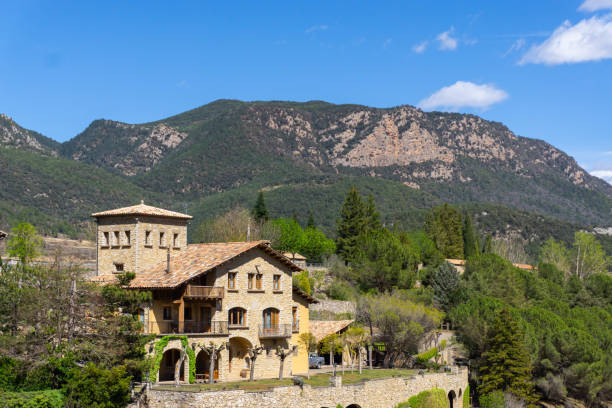 Solsonés, Spain - April 15, 2023: Mountain farmhouse in the Catalan Pyrenees on a sunny day