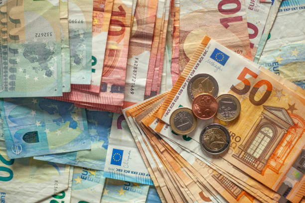 Euro banknotes and coins, Germany stock photo