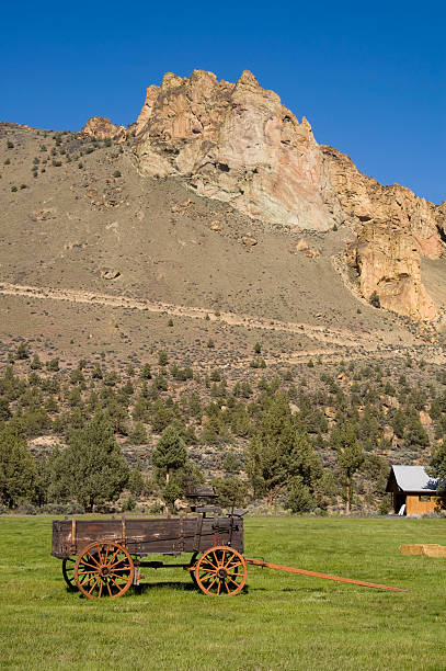 istock Smith Rock WIth Sage Brush and Old Wagon 148349629