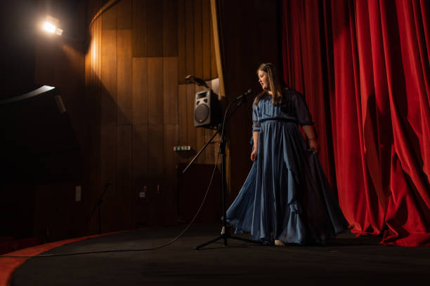 istock Young woman with down syndrome singing indoors 1483497583