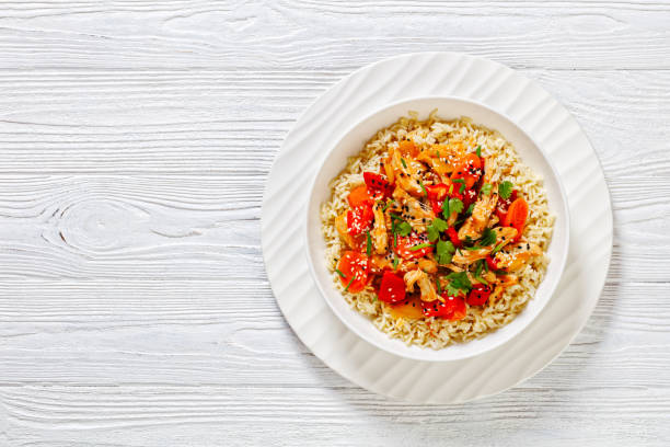istock sweet and sour chicken with veggies and rice 1483497760