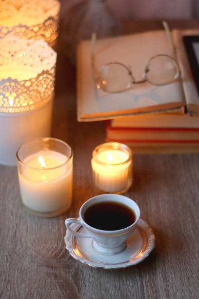 istock Books, Glasses, E-Reader, Pen, Tea, Cookies and Candles 1483498050