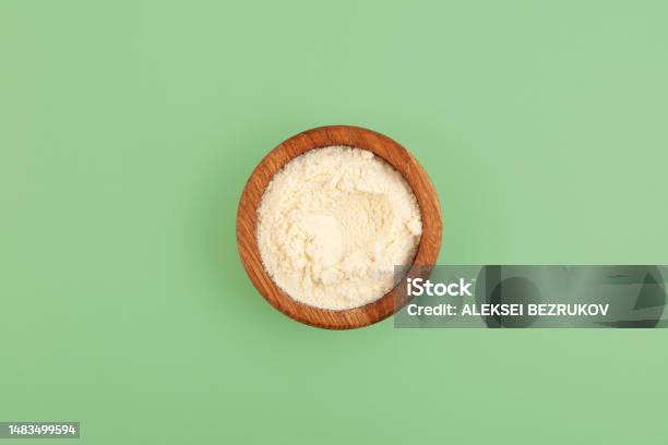 Food Additive E234 In Wooden Bowl Top View Nisin Powder Inhibits Yeast Growth Effective Drug Against Mold Does Not Affect The Taste Characteristics Stock Photo - Download Image Now