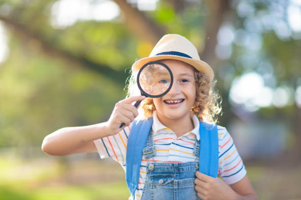 istock Kids explore nature. Children hike in sunny park. 1483500885