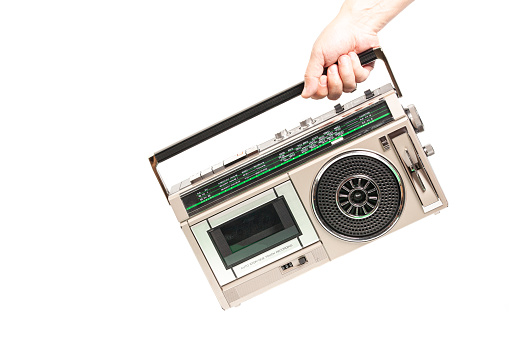 Retro ghetto radio boom box cassette recorder from 80s. in hand