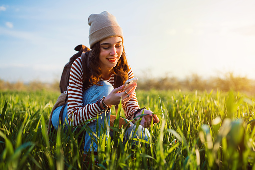 Young woman in wheat field.