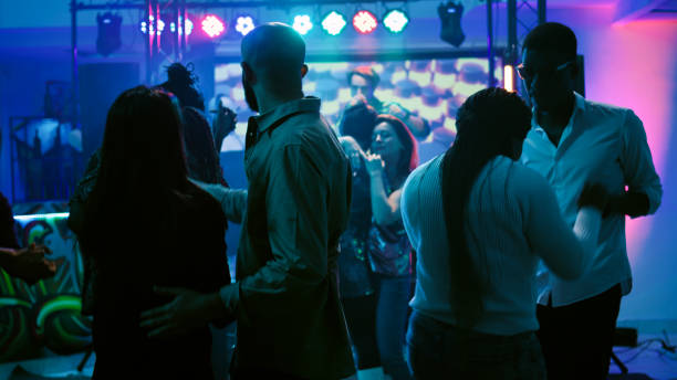 istock Happy persons enjoying slow music dance 1483507505