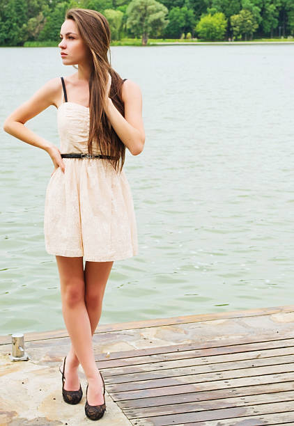 istock Young girl on the pier 148351100