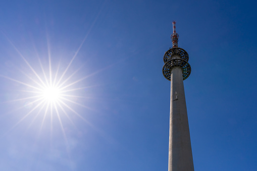 Telecommunication tower Trier-Petrisberg photographed against a blue sky
