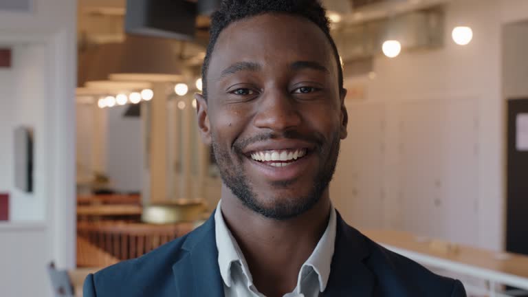 portrait african american businessman smiling confident black entrepreneur enjoying career proud manager in startup office success