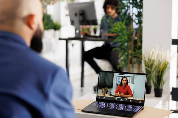 istock Manager discussing startup development with woman ceo in videocall 1483515943