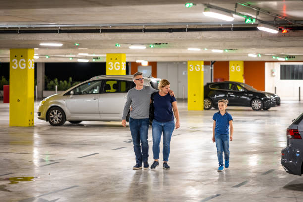 istock Family walking in parking space 1483517759