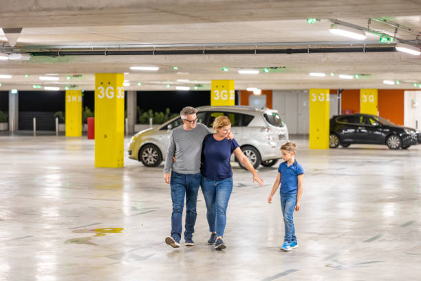 istock Family walking in parking space 1483517771