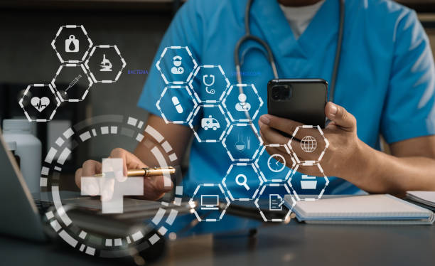 istock Doctor work on digital smartphone healthcare, doctor technology smartphone using computer in a modern office  in the morning at the desk. 1483517822